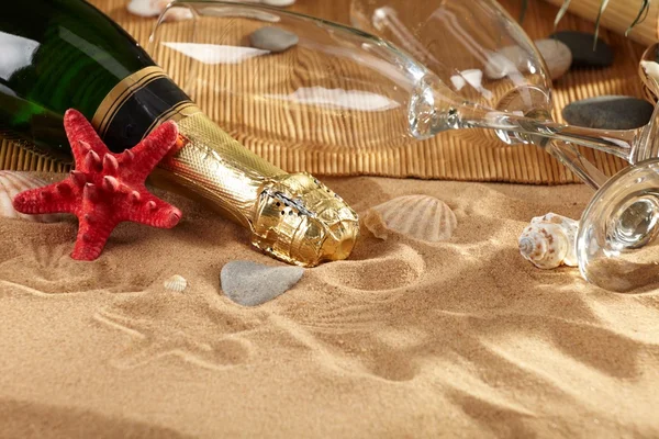 stock image Champagne sparkling on a beach