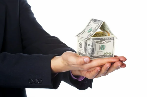 El dinero de la casa en manos humanas — Foto de Stock