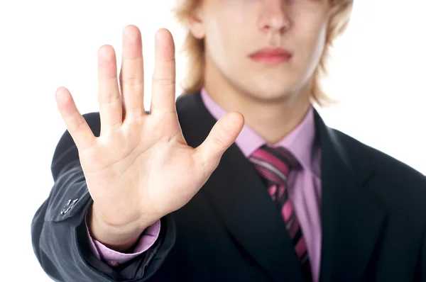 Een zakenman met een hand gebaar — Stockfoto