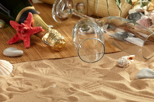 stock image Champagne sparkling on a beach