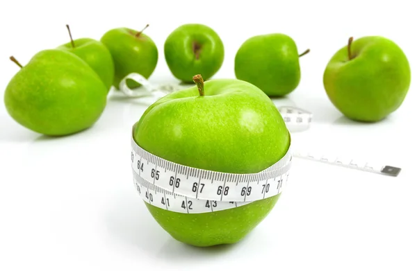 stock image Green apples measured the meter, sports apples