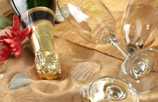 stock image Champagne sparkling on a beach