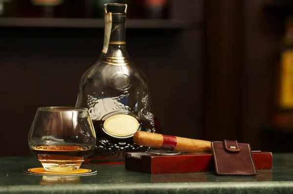 Classic cognac bottle, cigar — Stock Photo, Image