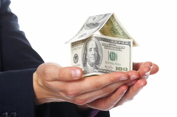 Het huis geld in menselijke handen — Stockfoto