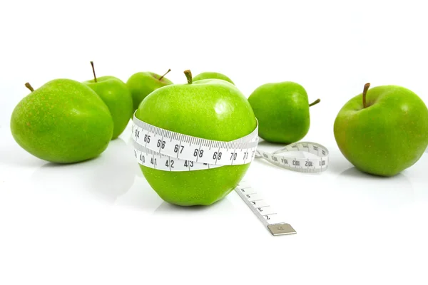 stock image Green apples measured the meter, sports apples