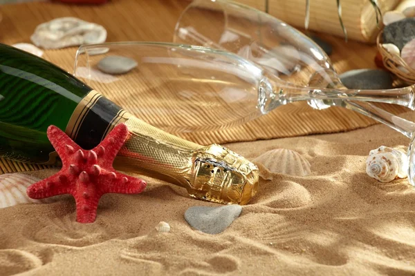 stock image Champagne sparkling on a beach