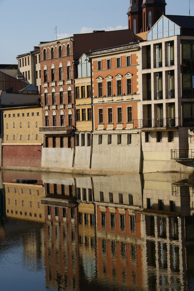 Buildings near river, polish town.