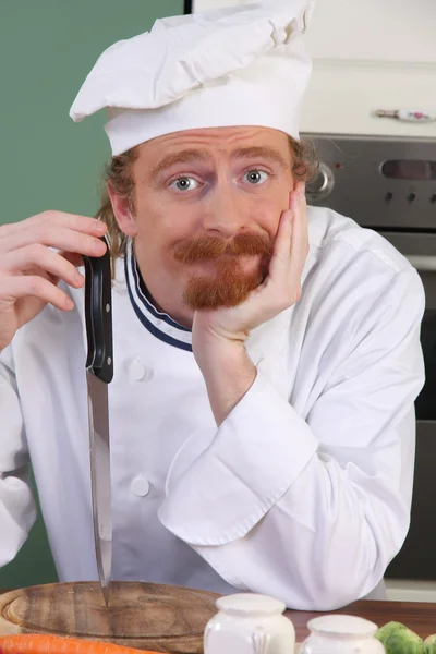 Young chef thinking for prepare lunch — Stock Photo, Image