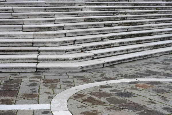 stock image The paving stones of the gray tiles and stone steps