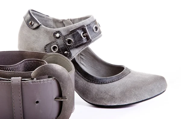 Nő cipő és a biztonsági öv — Stock Fotó
