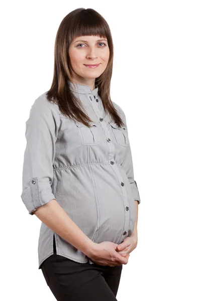 Schwangere schöne Frau isoliert auf weiß — Stockfoto