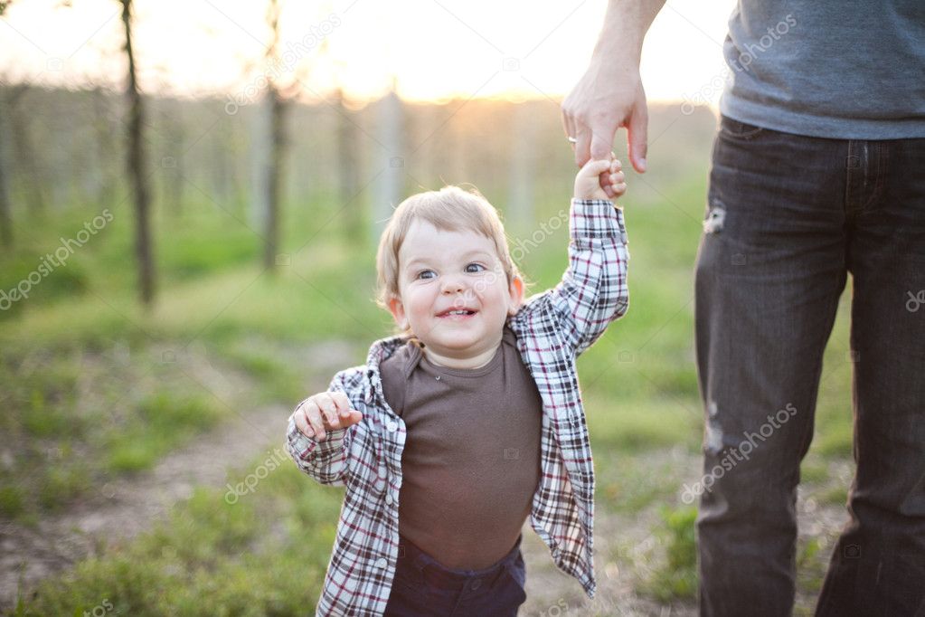 Father with little son outdoor portrait