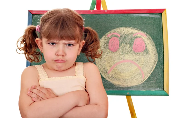 Wütendes kleines Mädchen und wütender Smiley — Stockfoto