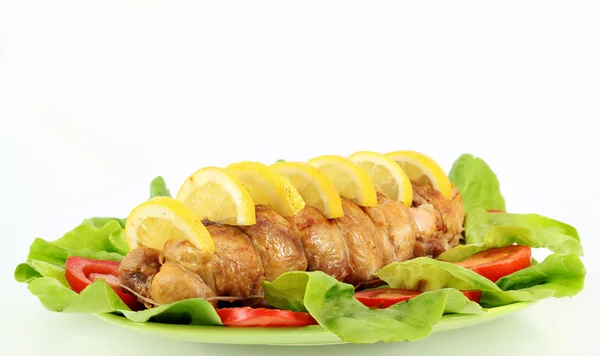 Chicken meat with lemon and salad — Stock Photo, Image
