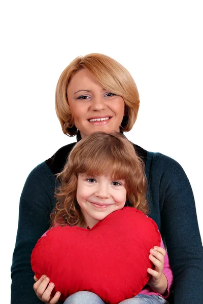 Happy matka a dcera s červeným srdcem — Stock fotografie