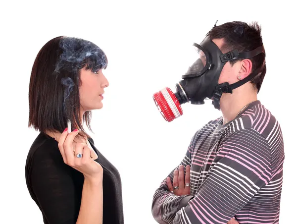 stock image Man with gas mask protects against tobacco smoke