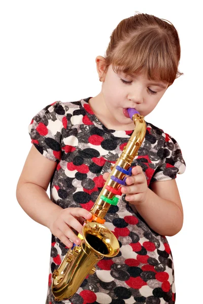 Küçük kız üzerinde saksafon çalan müziği — Stok fotoğraf