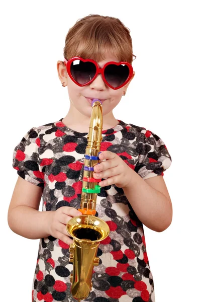 Little girl playing music on saxophone — Stock Photo, Image