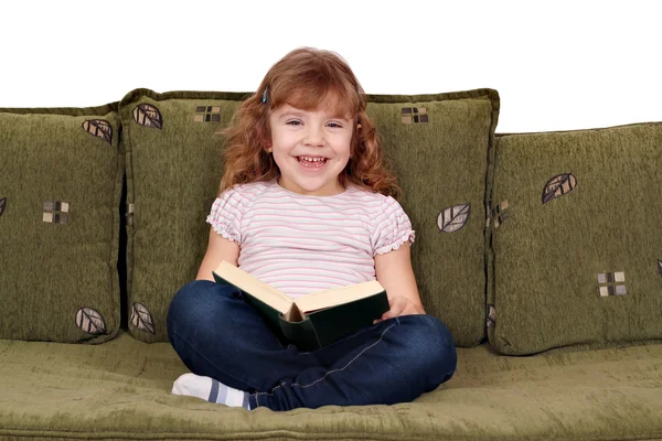 快乐的小女孩读一本书 — 图库照片