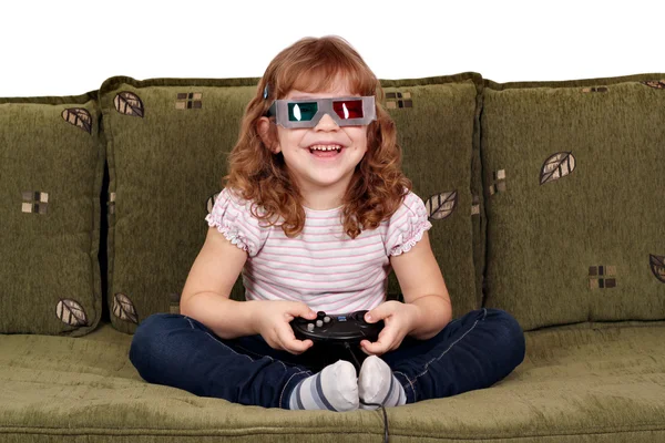 Happy little girl with 3d glasses play video game — Stock Photo, Image