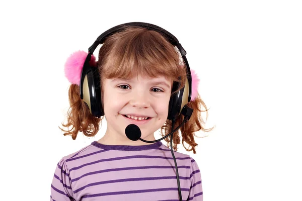 Glad liten flicka med hörlurar porträtt — Stockfoto