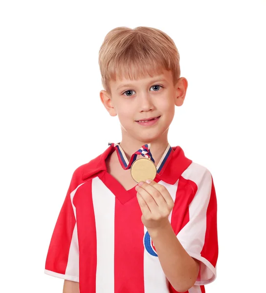Хлопчик із золотою медаллю — стокове фото
