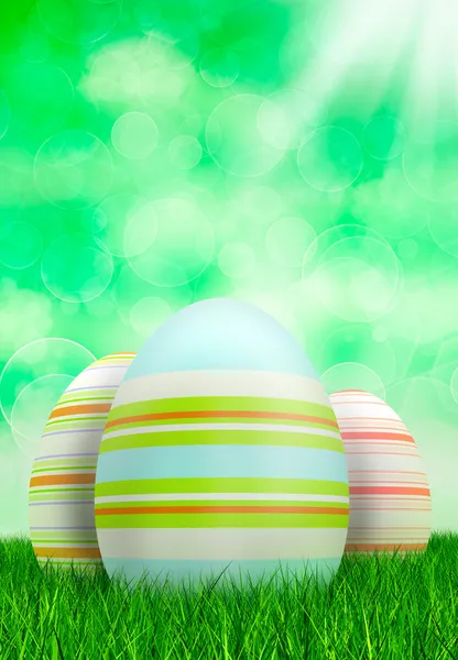 Easter eggs on green bokeh background — Stock Photo, Image