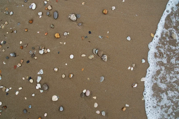 Small rocks at the beach — Stock Photo, Image