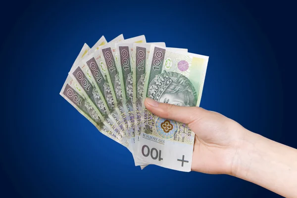 Lengyel pénz. kék háttér. — Stock Fotó