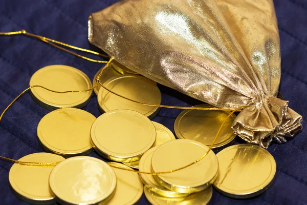 stock image Gold bag with gold chocolate coins