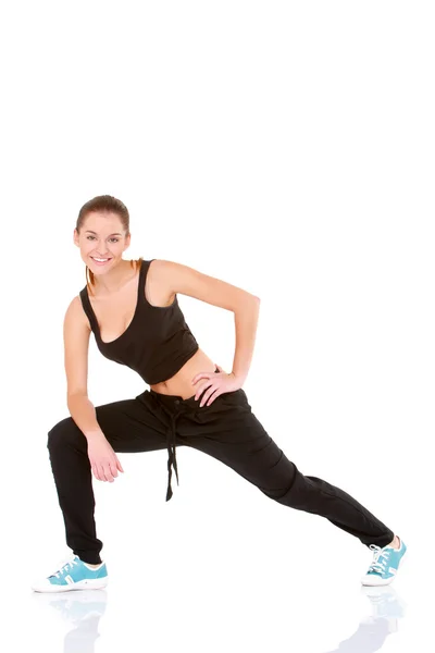 Γυναίκα όμορφη καταλληλότητας που κάνει άσκηση stretching — Φωτογραφία Αρχείου