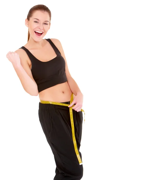 Mujer fitness con cinta métrica —  Fotos de Stock