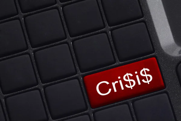 Mini keyboard with button saying Crisis — Stock Photo, Image