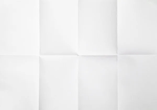 Белый лист бумаги сложенный — стоковое фото