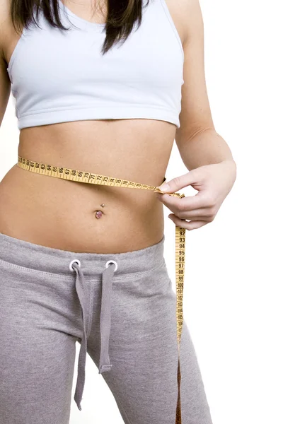 Žena, měření dokonalý tvar krásná stehna. jí zhubnout — Stock fotografie