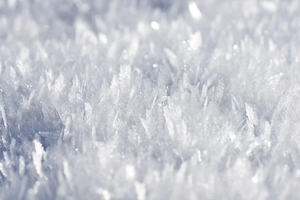 Weißer, flauschiger Schnee in Nahaufnahme — Stockfoto