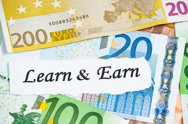 Learn and earn concept and euro notes