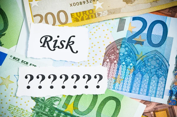 Risico of kans concept op geld — Stockfoto