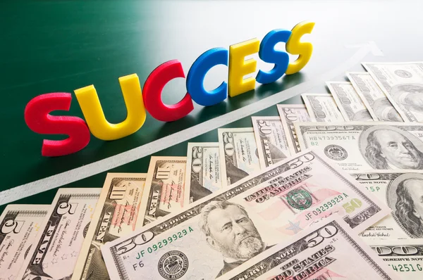 Colorful success words and growing US dollars — Stock Photo, Image