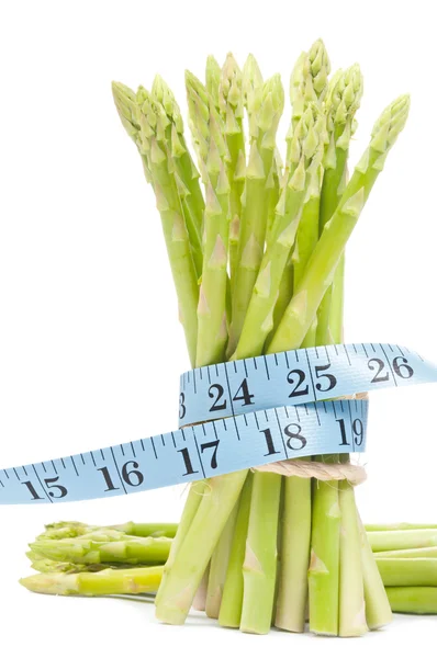 Lose weight concept, Asparagus with tape — Stock Photo, Image