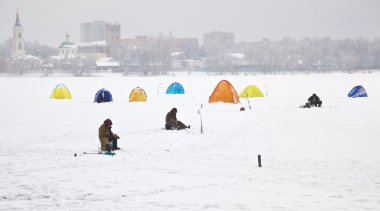 Fishermen on ice clipart