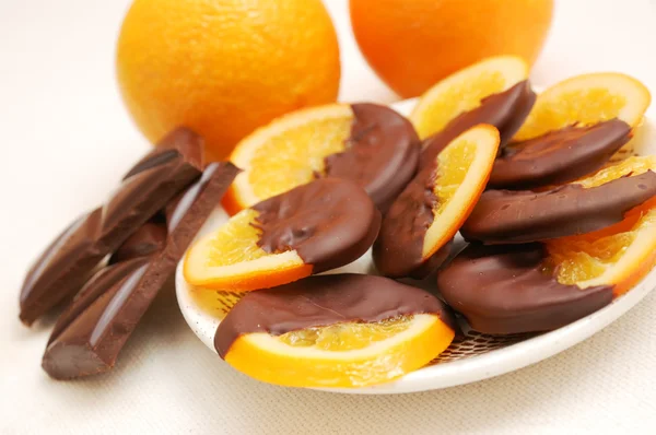 stock image Delicious slices of orange coated chocolate