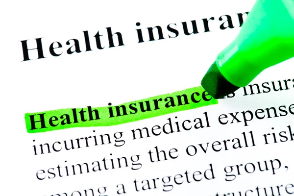 Health insurance definition highlighted in green — Stock Photo, Image