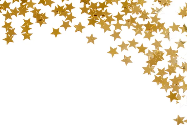 Christmas decoration of golden confetti stars — Stock Photo, Image