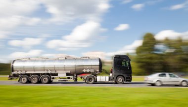 Petrol tanker truck in motion blur clipart