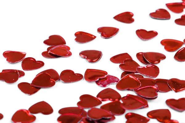 Confetti hearts on white background — Stock Photo, Image