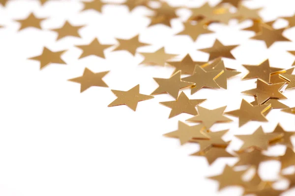 Confetti estrelas sobre fundo branco — Fotografia de Stock