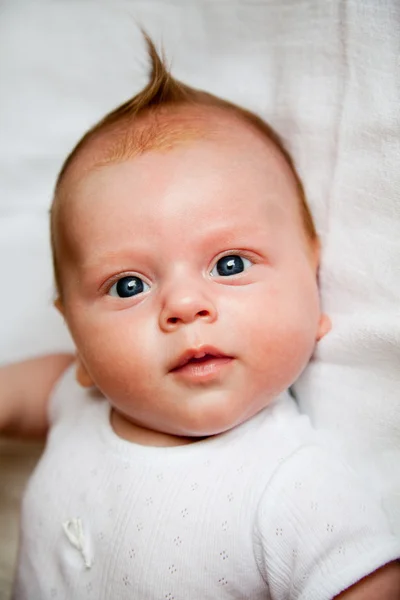Newborn boy with fancy haircut — Stock Photo, Image