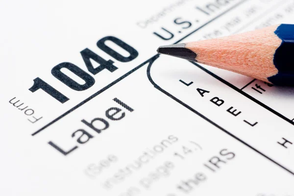Remplissage des formulaires d'impôt 1040 — Photo
