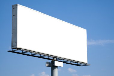 Blank billboard on blue sky clipart